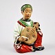 Playing nod 
doll, China. 
19th. Glazed 
clay. Overglaze 
decoration in 
green, green, 
red and white 
...