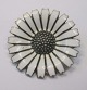 Margeritte 
brooch, 
sterling 
silver, A. 
Michelsen, 
Copenhagen, 
Denmark. 20th 
century. Dia: 
3.2cm. ...