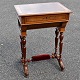 Danish sewing 
table in 
walnut, approx. 
1880. With four 
legs and leg 
supports. 
Decorated edge. 
...