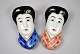 Pair of antique 
hang Japanese 
vases. app. 
1900. Painted 
porcelain. Man 
and woman in 
suits. ...