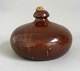 Heat water 
bottle in 
pottery, 19th 
century. 
Denmark. H: 14 
cm. Slide: 19 
cm. With a 
cork. ...