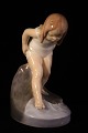 Bathing girl, 
porcelain 
figurine from 
Royal 
Copenhagen.
H: 13,5cm. 
Decoration 
number: ...
