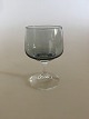 Holmegaard 
"Atlantic" 
Porter Glass. 9 
cm H. Smoke. 
Designed by Per 
Lütken 1962.