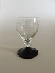 "Jane" 
Blackfooted 
Porter Glass 
with ingraved 
grapes. 
Holmegaard. 8 
cm H. 
Manufactured 
first in ...