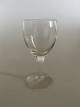 "Kirsten Pil" 
Porter Glass 
from 
Holmegaard. 11 
cm H. The glass 
is ingraved 
with round 
shapes ...