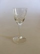 Holmegaard Ulla 
Schnapps Glass. 
Measures 10 cm 
H. Glass with 
cross and cut 
grinding on 
smooth stem.