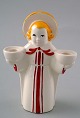 Royal 
Copenhagen 
angel 
candlestick in 
earthenware. 
13 cm. 
heights. 
In perfect 
condition. ...