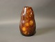 Ceramic vase in 
brown colors 
and with 
glitter in the 
glaze by an 
unknown artist.
H - 21 cm and 
...
