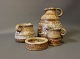 Stoneware 
serving in 
brown colors 
consisting of 
jug (650 DKK), 
cream jug (350 
DKK), sugar 
bowl ...