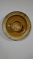 Danish clay 
fishing dish 
approx. 
1790-1800Front 
with 
age-related 
traces of use 
Diameter 27cm.