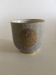 Bing & Grondahl 
Cracle vase 
with gold 
insignia No 
612/K.
Measures 8cm 
high and 8,3cm 
in dia ...