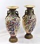 Pair of 
Japanese 
Satsuma vases. 
19th century. 
Faience. 
Polycrom 
decoration in 
the form of ...