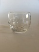 Marmelade Glass 
with Round 
Carvings. 
Measures 7 x 7 
cm. I good 
condition.