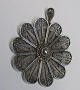 Sterling 
pendant, 
Laurits Berth, 
(after 1957) 
Copenhagen, 
Denmark. 
Filigran work. 
Shaped like ...