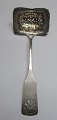 Sugar spoon in 
silver, master 
Hans Jessen 
Terkelsen (1822 
- 1887) Ribe, 
Denmark. Mussel 
pattern. ...