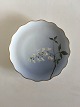 Bing & Grondahl 
Cake Plate with 
Flower 
decoration and 
goldrim. 17 cm 
diameter