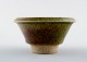 Kähler, 
Denmark, glazed 
stoneware vase.
Approx. 1960s. 
Stamped.
Measures: 9 
cm. x 6 cm.
In ...