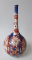 Imari Vase, 
19th Century. 
Japan. 
Decorated in 
blue - red with 
gilded flowers. 
H: 20.5 ...