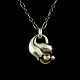 Georg Jensen 
Sterling Silver 
Pendant of the 
Year 1999 with 
Rose Quartz - 
Heritage.
Based on ...