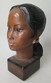 Carlsen, Poul 
Hauch (1921 - 
2006) Denmark. 
A Burma girl. 
Painted 
plaster. 
Signed: Height: 
21 cm.