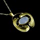 Bent Exner 
(1932-2006). 
Fire-gilded 
Sterling Silver 
Pendant 
Necklace with 
Ceylon 
Moonstone. ...