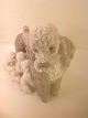 Figurines.
Poodle dog 
with five 
puppies 
receiving milk.
Height: 14.5 
cm. Length: 
16.5 ...