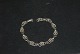 Bracelet with 
Blossom, Silver
Stamped: HS, 
830
Producer: 
Hermann 
Siersbøl
Length 17 ...