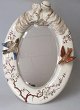 Japanese oval 
satsuma table 
mirror in 
faience, 20th 
century. 
Decoration with 
branches, two 
in ...