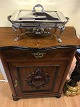 Console Cabinet 
in mahogany.
with relief of 
fruit on the 
lid.
Height: 83.5 
cm. Width: 70 
cm. ...