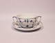 Royal 
Copenhagen blue 
fluted cup and 
saucer, 
#1/2199.
6x11 cm and 16 
cm.