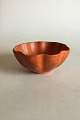 Herman A. Kahler Orange Uranium Glaze Bowl No 689. Measures 19 cm x 9 cm / 7 31/64" x 3 35/64"