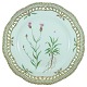 Royal 
Copenhagen, 
Flora Danica.
Flora Danica 
porcelain, 
dinner plate 
with pierced 
border #3553. 
...