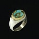 Ole Waldemar 
Jacobsen. 
Sterling Silver 
Ring with Gold 
and Turquoise.
Designed and 
crafted by ...