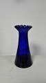 Blue hyacinth 
glass with wavy 
top edge  
Norway 19th 
century Height 
18.6cm.