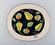 TIMO SARVIMÄKI 
for the Design 
House. Large 
dish with 
fruits.
Sweden 1960 s.
Measures: 33 
cm. x ...