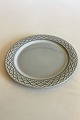 Bing and 
Grondahl/Kronjyden 
Grey Cordial 
Lunch Plate No. 
326. Measures 
21 cm / 8 17/64 
in.
