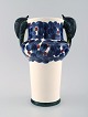 Aluminia, 
Copenhagen, 
rare snail 
vase, hand 
painted with 
snails and 
floral motifs.
Measures 24 
...