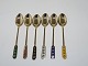 Egon Lauridsen 
sterling 
silver.
Six guildedl 
demitasse spoon 
with different 
colours enamel 
...