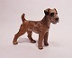 Dahl Jensen 
porcelain 
figure, 
Airedale 
Terrier, no. 
1079.
Dimensions: 
16x20x7 cm.

