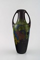 Elrakka, 
Arnhem, 
Holland, art 
nouveau ceramic 
vase with 
handles.
Hand painted 
with ...