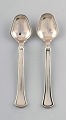 Two salt spoons 
Danish silver 
830s, Old 
Danish.
Stamped. 
1930/40 s.
Measures 6 cm.
In good ...