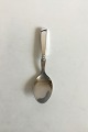 Cohr Serving 
Spoon in Silver 
and Stainless 
Steel Olympia. 
From 1948. 
Measures 17.4 
cm / 6 27/32 
in.