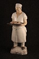 Porcelain 
figure of a 
baker from Bing 
& Grondahl.
Decoration 
number: 2223. 
2nd kind. 
Height: 28cm.