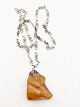 Scholle 930 
silver necklace 
64 cm. with 
amber pendant 5 
x 4.3 cm. No. 
341206