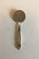 Georg Jensen 
Sterling Silver 
and Stainless 
Steel Server 
Acorn No 206. 
Measures 20.4 
cm / 8 1/32 in.