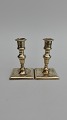 A pair of small 
baroque brass 
candlesticks. 
1700s Height 
10.5cm.