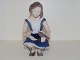 Bing & Grondahl 
figurine, girl 
feeding dove.
The factory 
hallmark shows 
that this was 
...