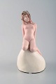 Vicken von Post 
for Rörstrand, 
Rare art deco 
figure in 
porcelain. 
Young nude 
woman on stone. 
ca. ...