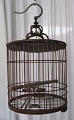 Bird cage in 
wood, 19./20. 
thC. China. 
Height: 55 cm.