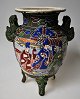 Japanese 
Satsuma jar 
without lid, 
19th century. 
Faience. On 
three feet and 
with two 
handles in ...